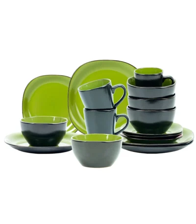 Elegant ceramic dinnerware set with green and black salad bowl, dinner plate, and soup bowl on a wooden table