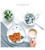 Colorful kids ceramic bowl set with four bowls featuring cute animal designs
