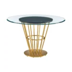 48 inch round glass dining table with gold stainless steel pedestal base in a modern dining room