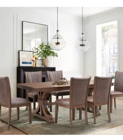 Oak dining table for 6-8, mid-century modern rectangular design with trestle pedestal base in a dining room