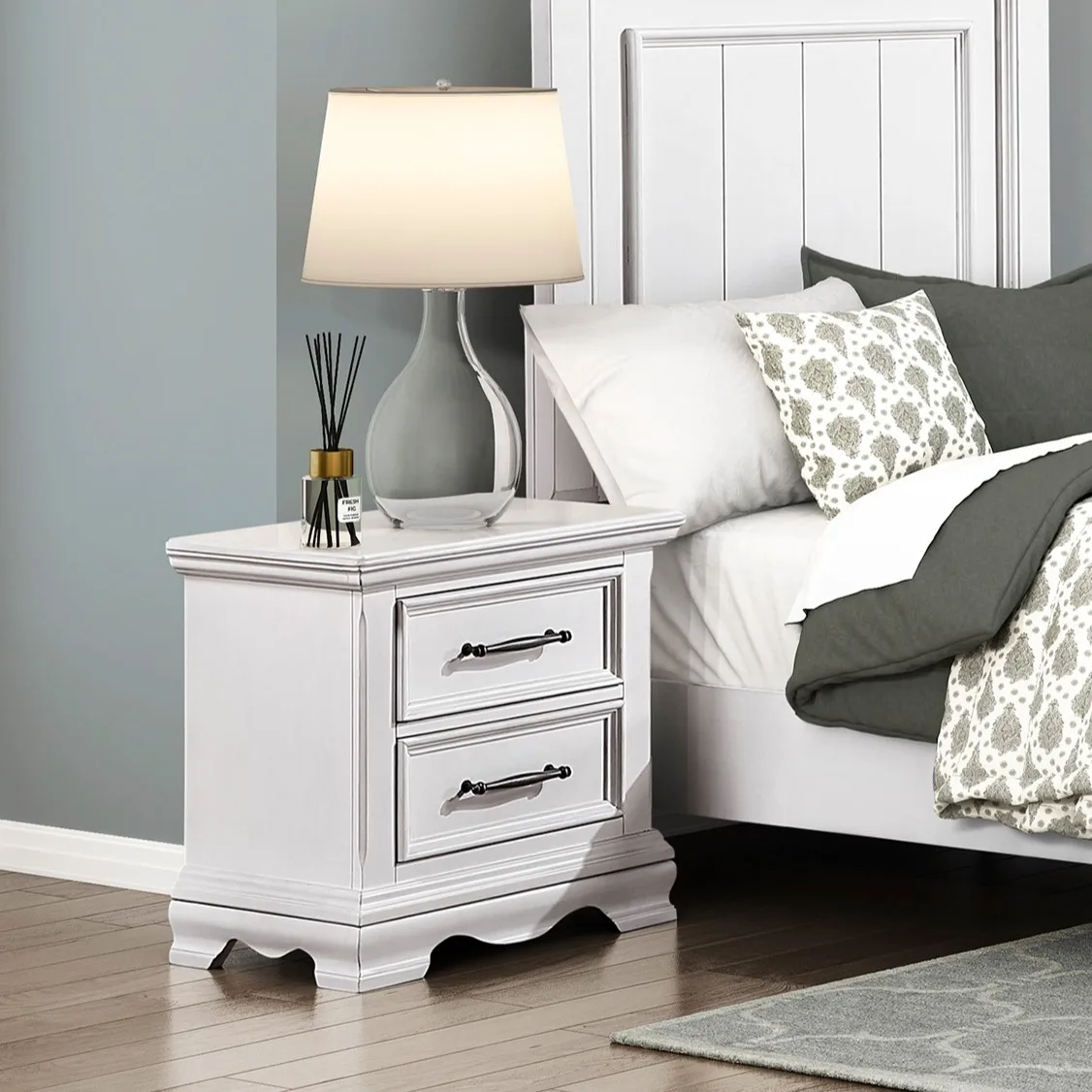 H9a4ea843ece54d5db005419a9a571b58h.webp White 2-drawer nightstand with black handles made of durable wood, a classic bedside table for bedroom storage