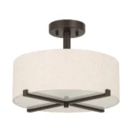 Semi flush mount light in a villa living room with high ceilings and natural light from windows.