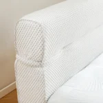 Modern all-in-one bed frame with box spring in cool-touch fabric, featuring motion isolation for undisturbed sleep