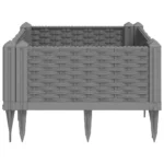 Large garden planter in light grey polypropylene with green plants on patio