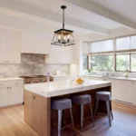 Goldoma pendant light with four empty sockets, shown in a modern interior with natural light and wooden furniture.