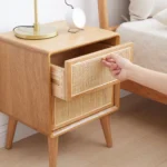 Solid oak bedside cabinet with rattan drawers in modern Nordic style