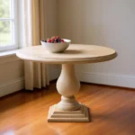 48-inch natural solid wood round dining table with pedestal base in a dining room setting