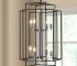 Goldoma 18-inch modern geometric pendant chandelier with industrial metal frame, hanging from ceiling in a living room
