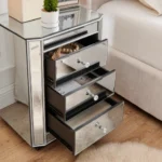 Crushed diamond mirrored nightstand with three drawers in a modern bedroom setting