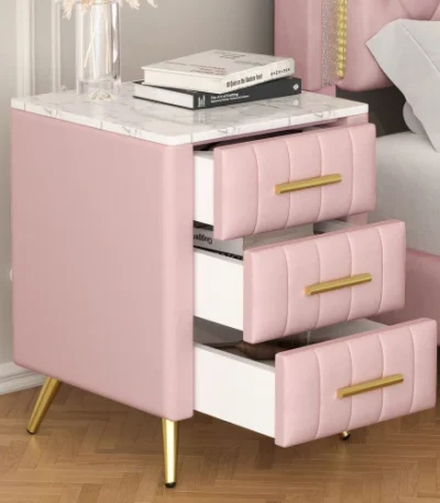 Modern upholstered nightstand with 3 drawers and metal legs in bedroom setting