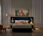 Queen size modern adjustable velvet bed frame with vertical channel tufted wingback headboard in a stylish bedroom setting