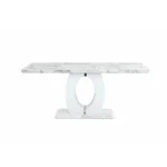 71 inch white marble dining table with pedestal base and chrome accents in a contemporary dining room setting