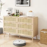 Modern European rattan dresser with six drawers and solid oak handles in a bedroom