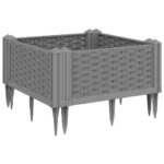 Large garden planter in light grey polypropylene with green plants on patio