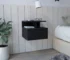 Black floating nightstand with drawer and open shelves mounted on wall