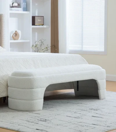 Goldoma boucle fabric ottoman as a foot stool in a modern living room