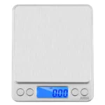 Digital kitchen scale 500g with stainless steel surface and LCD display showing weight