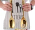 Goldoma salad serving set with stainless steel spoon and fork on a wooden table