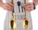 Goldoma salad serving set with stainless steel spoon and fork on a wooden table