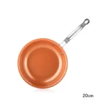 Goldoma nonstick frying pan with ceramic titanium coating on a stove