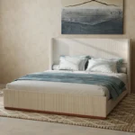 Goldoma queen size solid wood upholstered bed frame with cream corduroy wingback headboard in a modern bedroom
