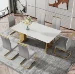 Modern square stone dining table with white marble glass top and gold metal legs in a contemporary dining room