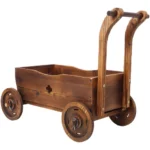 Close-up of the brown wooden mobile garden planter showing the handle and drain hole.