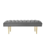 Goldoma 53 inch light gray velvet bench with gold metal frame in a bedroom setting