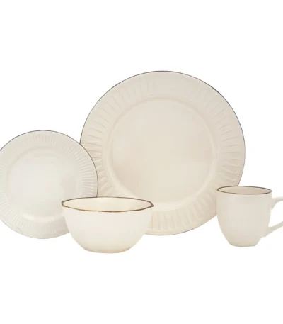 HMS Ivory stoneware dinnerware set with plates and bowls on a wooden table