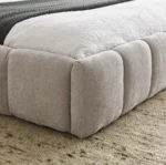 Goldoma adjustable queen size bed with chenille upholstered headboard and oak frame in modern bedroom setting