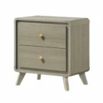 Modern nightstand with USB port and gold capped legs in bedroom setting