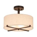 Close-up of the semi flush pendant light showing its textured fabric shade and brushed gold metal base.