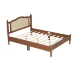 Modern teak finish full size bed with fabric upholstered headboard in a bedroom setting