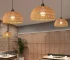 Modern chandelier pendant lighting with adjustable height hanging wires in a contemporary dining room