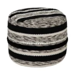 White cotton striped pouf ottoman used as foot stool in living room