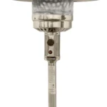 Goldoma silver steel propane heater with control knob and hose connection visible, on a stone patio