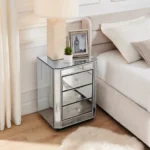 Crushed diamond mirrored nightstand with three drawers in a modern bedroom setting