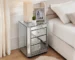 Modern 3-drawer crushed diamond nightstand with mirrored finish in a bedroom setting