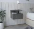 Smoke grey floating nightstand drawer with shelves mounted on wall beside bed