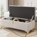 Goldoma velvet storage ottoman bench with metal legs in gray, showing hidden storage compartment and soft upholstery