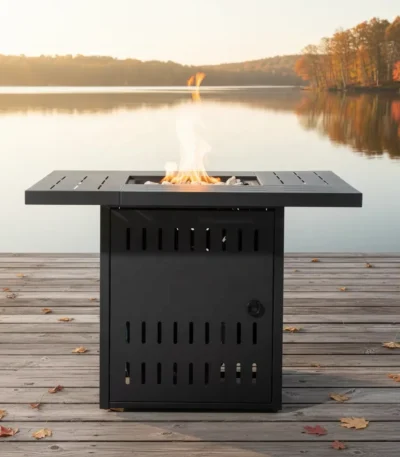 Propane fire pit table with blue flame on patio surrounded by chairs