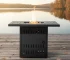 Propane fire pit table with blue flame on patio surrounded by chairs