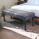 47-inch upholstered bench with blue and cream abstract pattern and blue legs in a living room