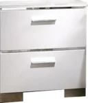 Glam white nightstand with chrome handles and high gloss lacquer finish, featuring two drawers, placed beside a bed in a modern bedroom.
