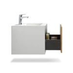 Empty resin sink basin inside the Goldoma floating vanity, showing smooth surface and drain