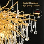 Modern gold chandelier with crystal branches illuminating a dining room