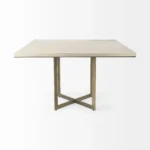 Modern square dining table with gold metal X-shaped base and light beige brown wood top