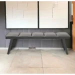 Gray faux leather storage bench with padded seat and hidden storage compartment, 57-inch width by Goldoma