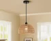 Boho pendant light hanging over a kitchen island, woven rattan and rope chandelier