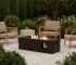 Propane fire pit with glass beads glowing at dusk